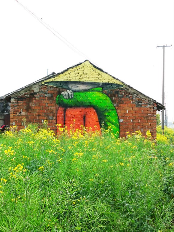 在废墟上作画的法国艺术家 明年要在全中国“为爱上色”